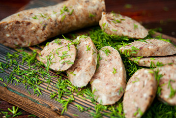 Liver sausage sprinkled with green dill.