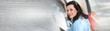 © thodonal - Young woman walking with shopping bags in hand. panoramic banner
