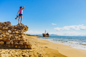 Wall Mural - Tourist take photo on beach sea shore