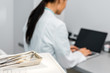 © LIGHTFIELD STUDIOS - selective focus of instruments near female doctor typing on laptop