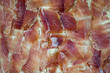 jamon slices tightly laid on a board