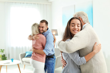 Poster - Happy family at home, space for text. Reunion of generations