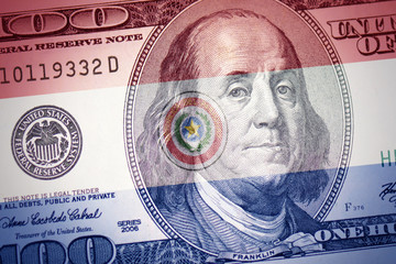 flag of paraguay on a american dollar money background