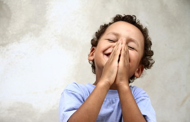 Sticker - little boy praying stock photo