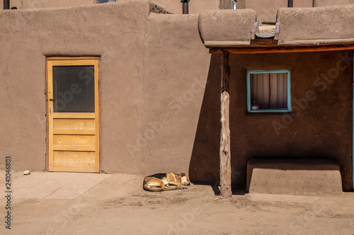 Mud Adobe Pueblo Building In American Southwest With New Wooden