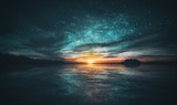 Fototapeta Zachód słońca - Stars reflected in the water of the archipelago during sunset
