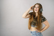 © Voyagerix - Teen women wearing headphones