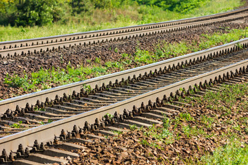 Two Railways oncoming direction in the suburbs. Parallel straight paths.