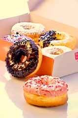 donuts with sprinkles on white background