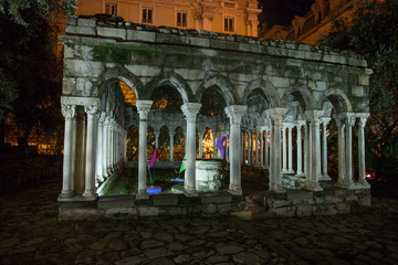 Wall Mural - GENOA, ITALY, NOVEMBER 24, 2018 - Saint Andrew cloister ruins near the house of Christopher Columbus, (Casa di Colombo), by night, in Genoa, Italy.