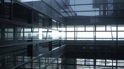 Canvas Print - Inside the glass elevator in building while moving