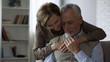 © motortion - Retiree lady hugging man, loving relations in long marriage, closeness and care
