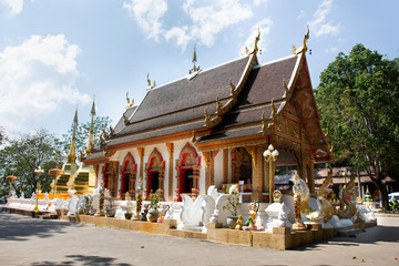 Thai people travel visit and respect praying chedi and Buddha's relics at Wat Phra That Doi Tung in Chiang Rai, Thailand