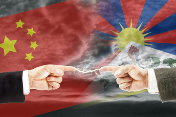 Wall Mural - Confrontation and enmity between China and Tibet. Conflict and stress in the international policy