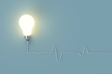 minimal concept. outstanding glowing light bulb with cable on blue background for copy space.
