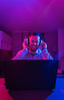 © ADDICTIVE STOCK - Man listening cheerfully to music with headphones.