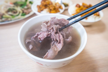 Wall Mural - Taiwan famous food - Tainan beef soup, traditional breakfast in Tainan, Taiwan.