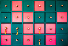 High Contrast Colorful Pattern Of Square Drawers, Pink And Green