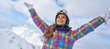 © ZoomTeam - Close up portrait of a woman at a snow ski center.