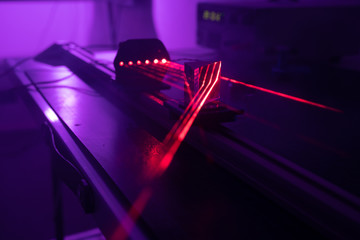 Poster - Experiment with red laser in optics lab