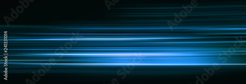 Fotomural Abstract blue light trails in the dark, motion blur effect