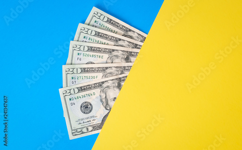 Cuadros en Lienzo Cash Money on colorful background
