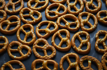 Salted pretzel on table