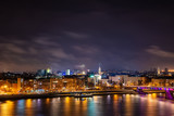 Fototapeta  - Novi Sad, Serbia - January 01, 2019: Panorama of Novi Sad and Danube river at night