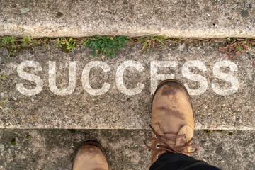 Wall Mural - Man stepping up a stairs