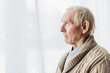 © LIGHTFIELD STUDIOS - sad senior man with dementia disease at home