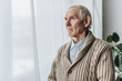 © LIGHTFIELD STUDIOS - upset retired man with dementia disease standing at home