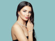 © millaf (Nemchinova) - Cheerful girl with jewelry portrait. Brunette woman with makeup, permed hair and diamond necklace