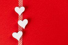 Valentines Day Background With Red Background And White Hearts And Ribbon