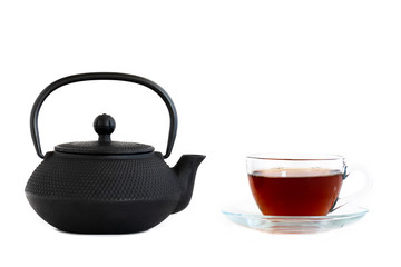 Poster - black cast iron teapot, Cup of tea, isolated on white background