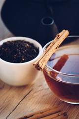 Poster - Cup of tea and kettle, iron, dry leaves and cinnamon