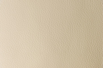 Textured background surface of textile upholstery furniture close-up. leatherette beige color fabric structure