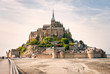 Panoramic view of famous Le Mont Saint Michelewith blue sky and clouds, Normandy, northern France