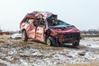 A red car that was destroyed by a tornado in Washington, Illinois in November