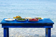 Table of traditional Aegean appetizers at sea side