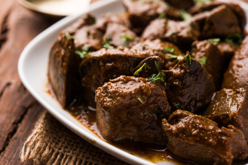 Canvas Print - Mutton Liver fry or Kaleji masala, popular Non vegetarian recipe from India and Pakistan. served dry or with curry in a bowl, karahi or plate