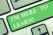 © Artur - Writing note showing I M Here To Learn. Business photo showcasing School attendance searching for knowledge education Keyboard key Intention to create computer message pressing keypad idea