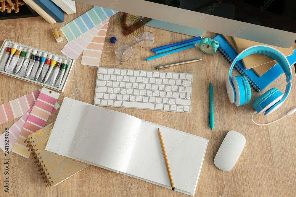 Stylish workplace of designer with modern computer