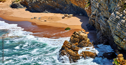 Fotografie, Tablou Surf at coast of Atlantic Ocean in Portugal. Beach with golden