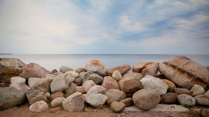 A pile of stones on the lake.