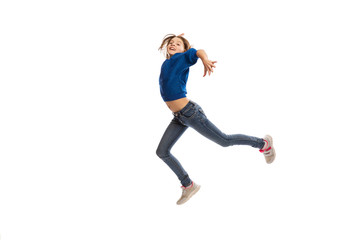 cute teen girl in a jump, isolated on white background