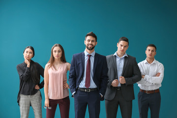 Team of young people on color background