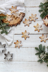 Flat lay of homemade cookies on a white wooden background