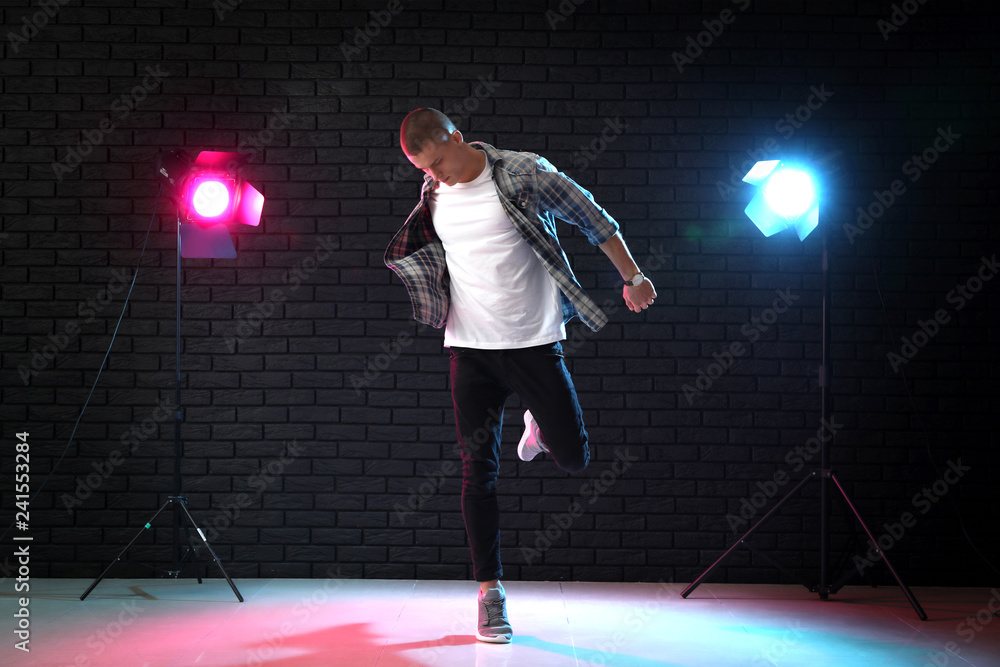 Young man dancing in club