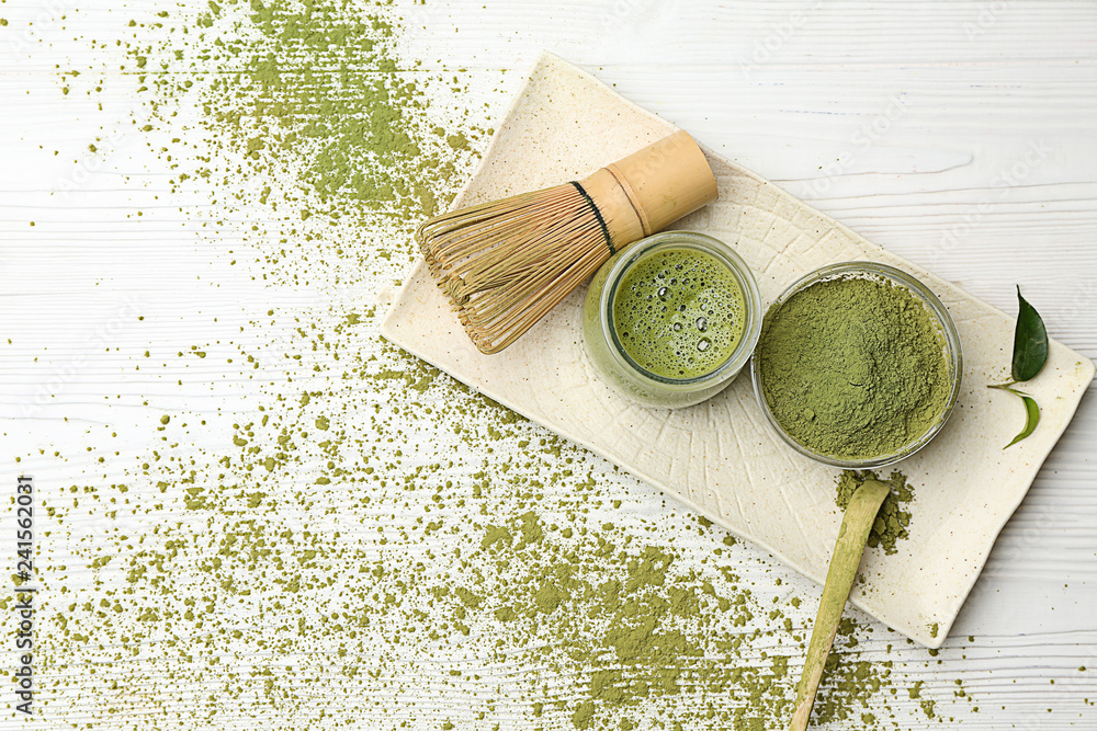 Composition with healthy matcha tea on table