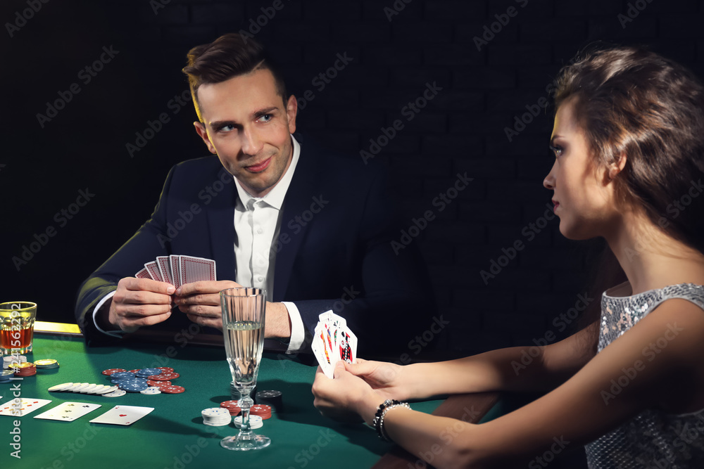 People playing cards in casino